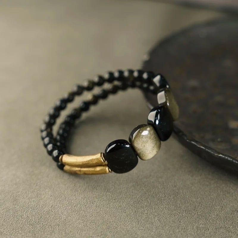 Padmapani - Bracelet Tibétain en Obsidienne Dorée et Laiton