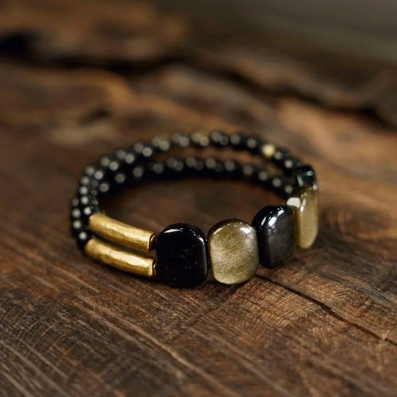 Padmapani - Bracelet Tibétain en Obsidienne Dorée et Laiton