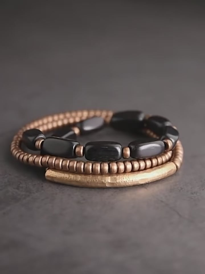 bracelet artisanal tibétain en laiton martelé et ébène pour sérénité et protection